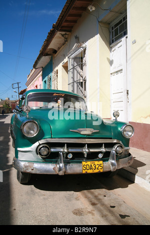 Vintage car on a street in Trinidad Sancti Spíritus Province Cuba Latin America Stock Photo