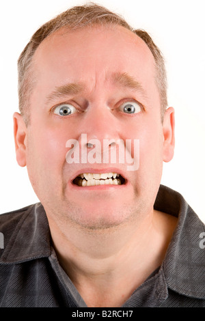 Portrait of someone being stressed out isolated on white Stock Photo