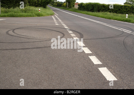 January 2008 - Skid marks on a quiet rural road left by bored teenage drivers Stock Photo