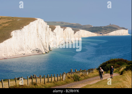 People walking near the seven sisters east sussex Stock Photo