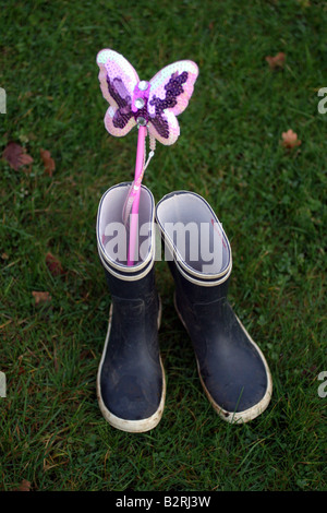 Boots in the garden Stock Photo - Alamy