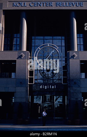 Retro image of Business man standing outside of office building toward sunset Bellevue Washington State USA Stock Photo