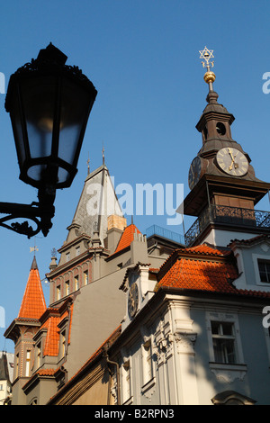 A view of the clock tower of the High Synagogue and former Jewish Town hall in Prague Stock Photo