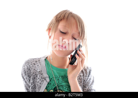 Unsure Teenage Girl Using Mobile Phone Model Released Stock Photo
