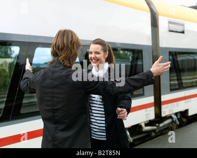 Young couple on train station Stock Photo