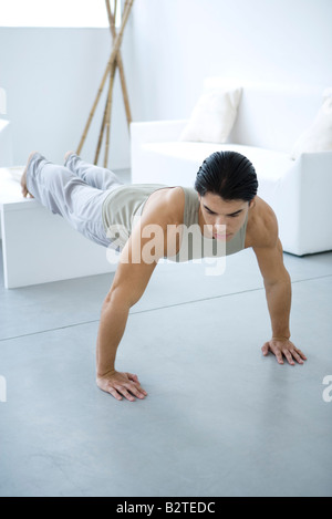 Man doing push-ups Stock Photo