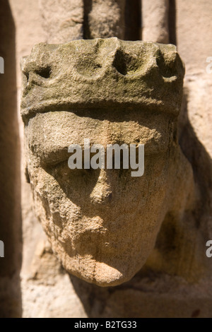 A detail from St Nicholas Church in Durham. The crowned sandstone figure represents a medieval king. Stock Photo