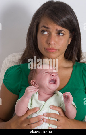 teenager mother with baby Stock Photo