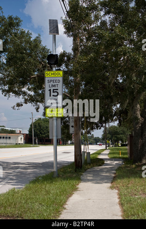 Solar Powered Flashing School Zone Warning Sign Stock Photo