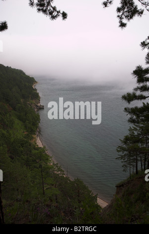 Mist of the shore of Lake Baikal, in the village of Listvyanka in Siberia, Russia. Stock Photo