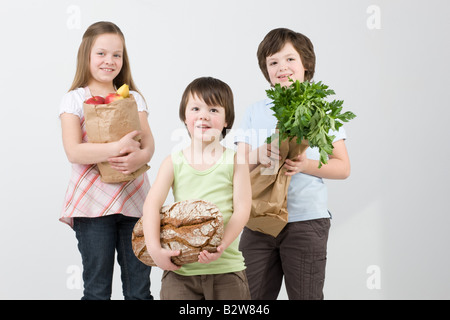 Children with groceries Stock Photo
