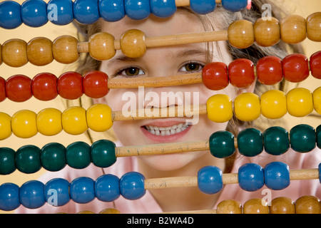 Girl with an abacus Stock Photo