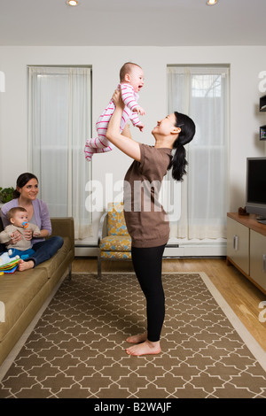 Mothers with their babies Stock Photo