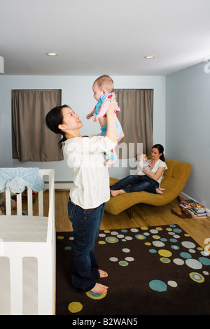 Mothers with their babies Stock Photo