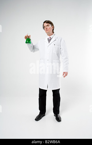 Scientist holding flask Stock Photo