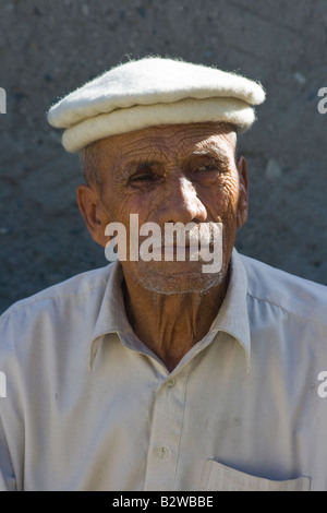 Aging Ismaili Hunza Man in Karimabad in Northern Pakistan Stock Photo