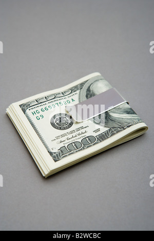 One hundred dollar bills in money clip Stock Photo