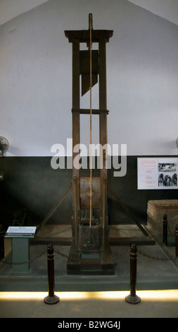 Guillotine and death row cells infamous French and Vietnamese Hoa Lo prison also called the Hanoi Hilton Vietnam Stock Photo