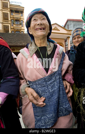 Black Hmong hilltribe woman with missing teeth market Sapa Vietnam Stock Photo