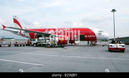 New Air Asia Airbus with sponsor Manchester United badge on engine Kuala Lumpur Malaysia Stock Photo