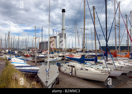 Shoreham Power Station seen through a marina of small yachts in Shoreham Harbour West Sussex Stock Photo