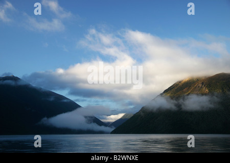 Early morning cloud over Lake Rotoiti in Nelson Lakes National Park near St. Arnaud, South Island, New Zealand Stock Photo