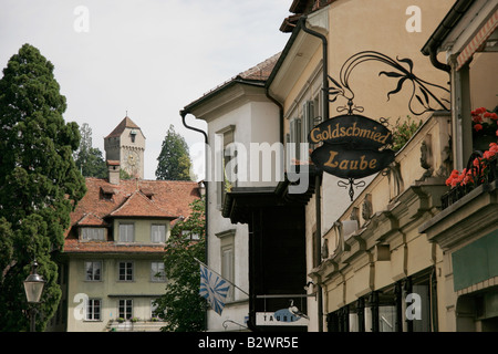 Zyt tower of the Rampart Wall seen on the horizon of a traditional Swiss street in old Lucerne, Central Switzerland Stock Photo