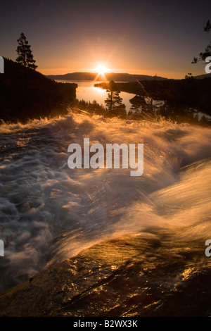 A late spring sunrise illuminates Eagle Falls above Emerald bay Lake Tahoe California Stock Photo