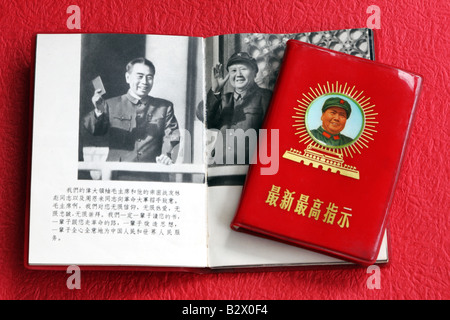 Chairman Mao Zedong and Premier Zhou Enlai on top of Tian An Men Square with Zhou waving the famous little red Mao Book Stock Photo