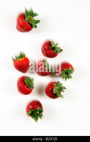 Strawberries falling Stock Photo