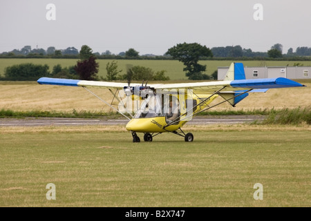 Thruster T600N-450 Sprint G-OMAL microilight aircraft taxiing at Wickenby Airfield Stock Photo