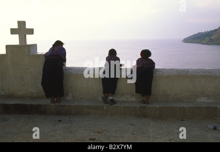 Women overlooking Lake Atitlan from the village of San Antonio Palopo in the Guatemalan highlands Stock Photo