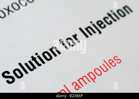 Front of a pharmaceutical box of Vitamin B12 ampoules, with the words 'Solution for Injection' Stock Photo