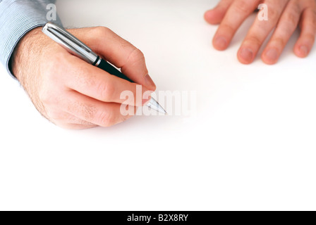Closeup of businessman s hands on white background holding a pen Stock Photo