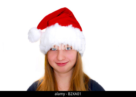 Portrait of a young girl wearing Santa s hat isolated on white background