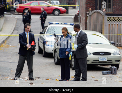 Police investigate a murder crime scene on a city street, Boston, Massahcusetts Stock Photo