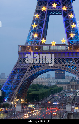 The Eiffel tower illuminated with the yellow and blue colours of the European Union flag in Paris, France. Stock Photo