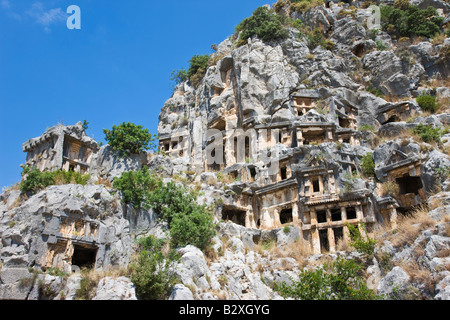 Ancient Lycian rock tombs in Myra, near Kale, Eastern Mediterranean Turkey Stock Photo