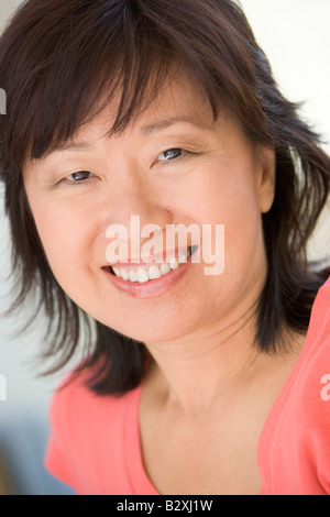 Head shot of woman smiling Stock Photo