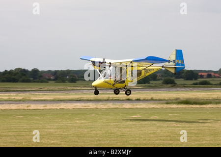 Thruster T600N-450 Sprint G-OMAL micrilight aircraft taking-off from Wickenby Airfield Stock Photo