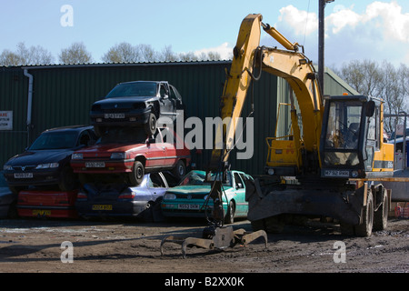 Piles of scrap cars in a scrapyard Stock Photo