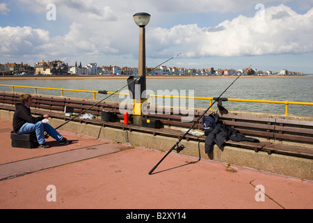 Fishing off the pier in Deal Kent Stock Photo