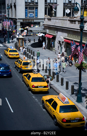 Taxi cabs lined up at the taxi stand outside of Grand Central terminal in Manhattan, NY. Stock Photo