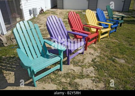 Rainbow colored wooden chairs, known as Maine Chairs 