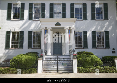 Green shutters on a white house in Pocomoke City, the Eastern Shore of Maryland Stock Photo