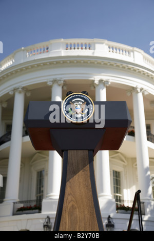 Presidential Seal on podium in front of the South Portico of the White House, the Truman Balcony, in Washington, DC Stock Photo