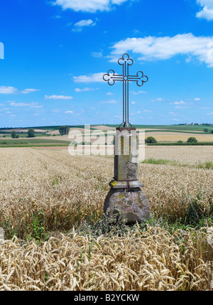 WROUGHT IRON CROSS IN WHEAT FIELD ALSACE FRANCE EUROPE Stock Photo