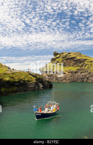 Fishing boat returning to harbour Stock Photo - Alamy
