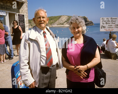 UK England Dorset Lulworth Cove retired couple on holiday Stock Photo