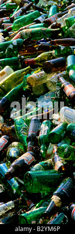Glass bottles in a glass recycling centre Stock Photo